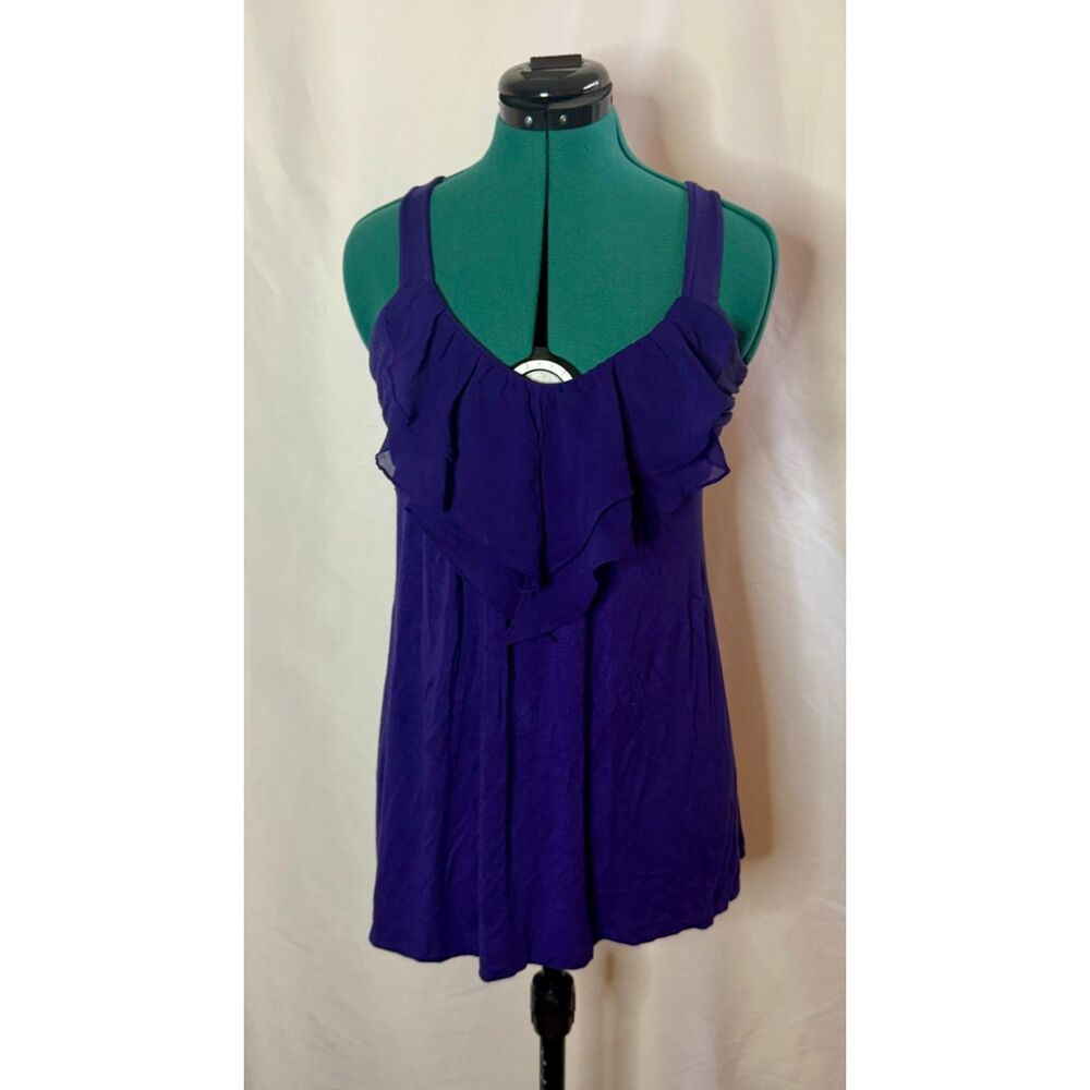 DB BM vibrant purple sleeveless top featuring a tiered ruffle neckline